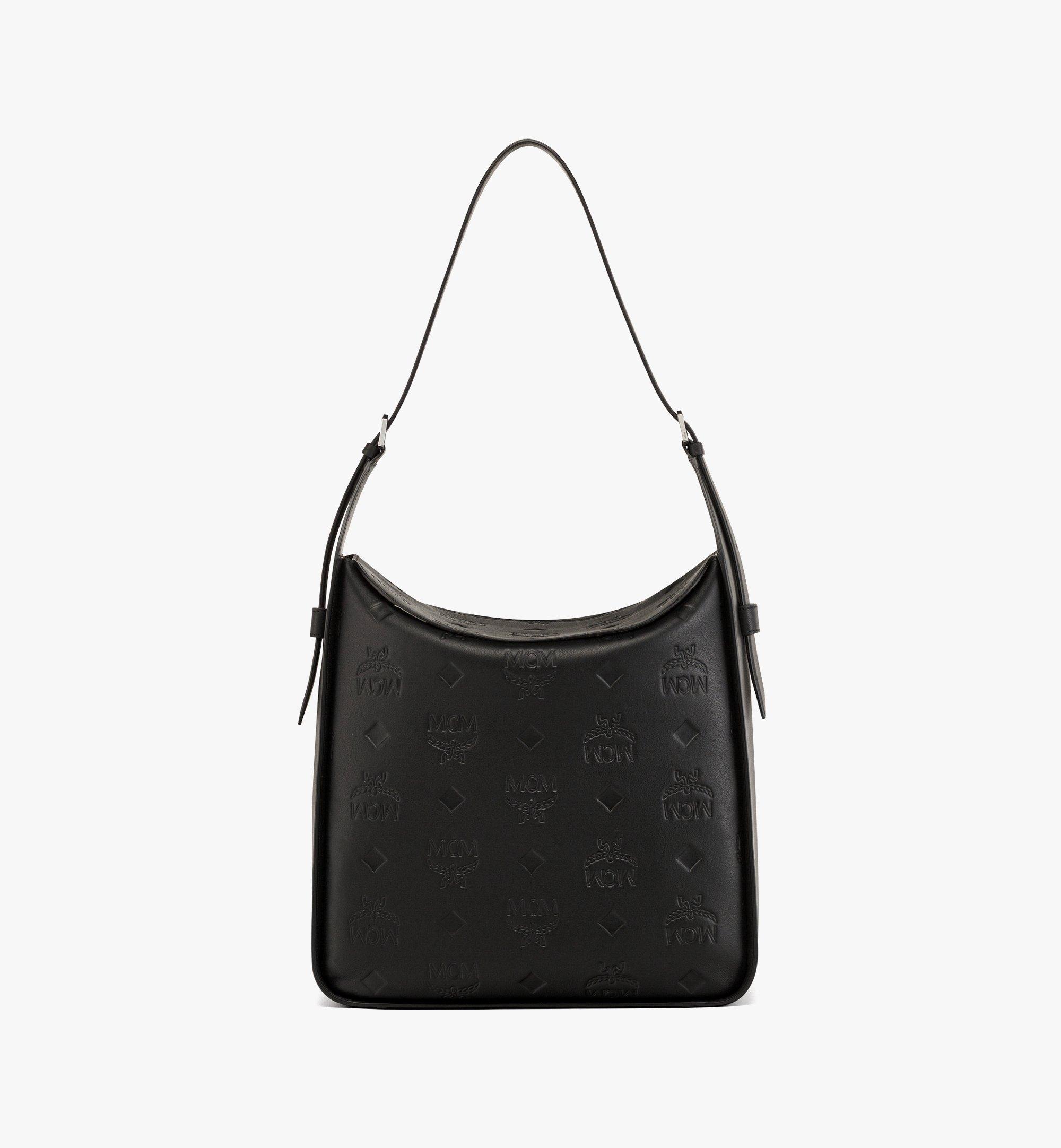 Sac hobo Aren vertical à rabat en cuir monogrammé embossé 1